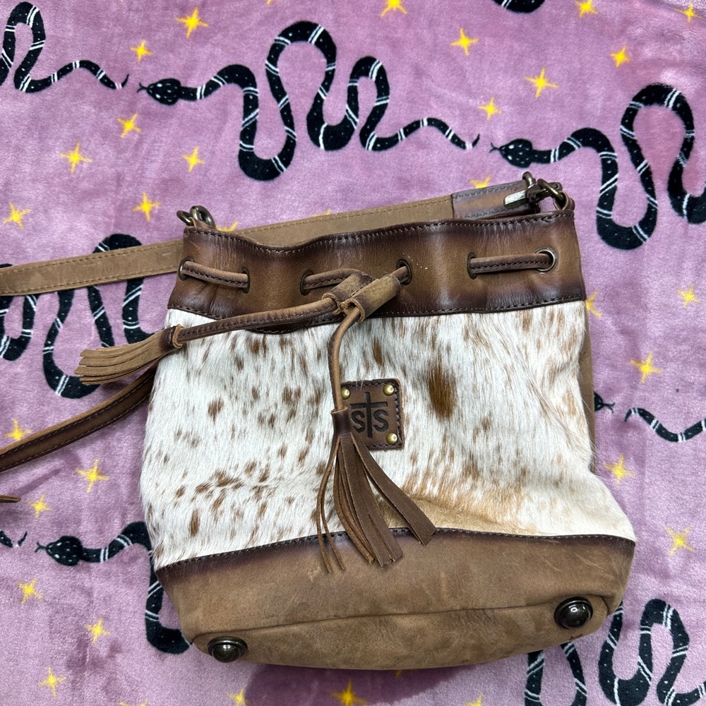 Cow print STS bucket bag